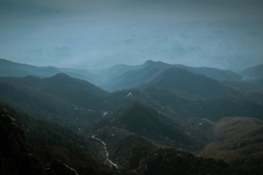 The layered blue mountain ridgelines seen from the Pinnacle Overlook at Cumberland Gap near Middlesboro, Kentucky