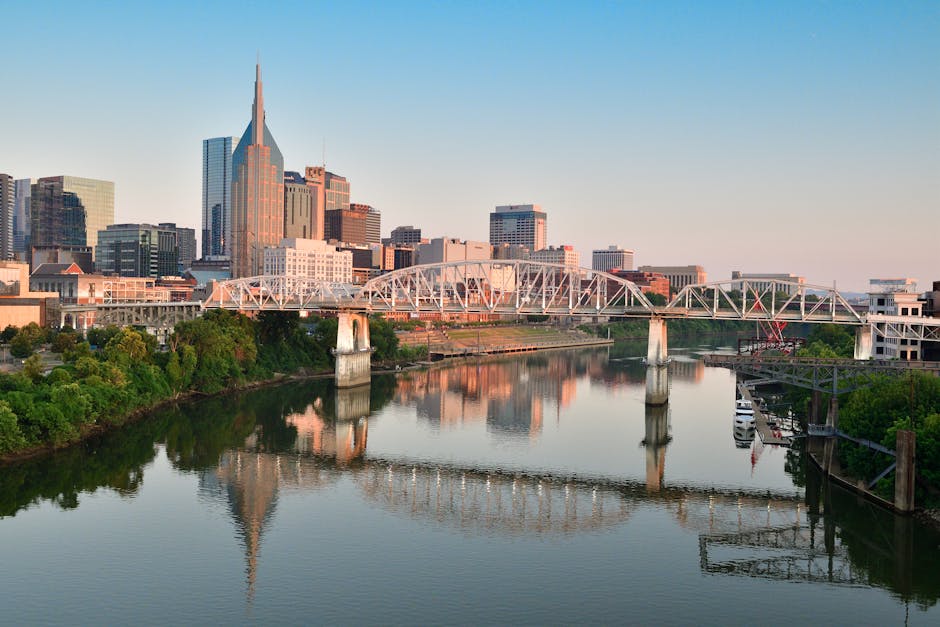 The Nashville skyline with its distinctive buildings against a warm sky