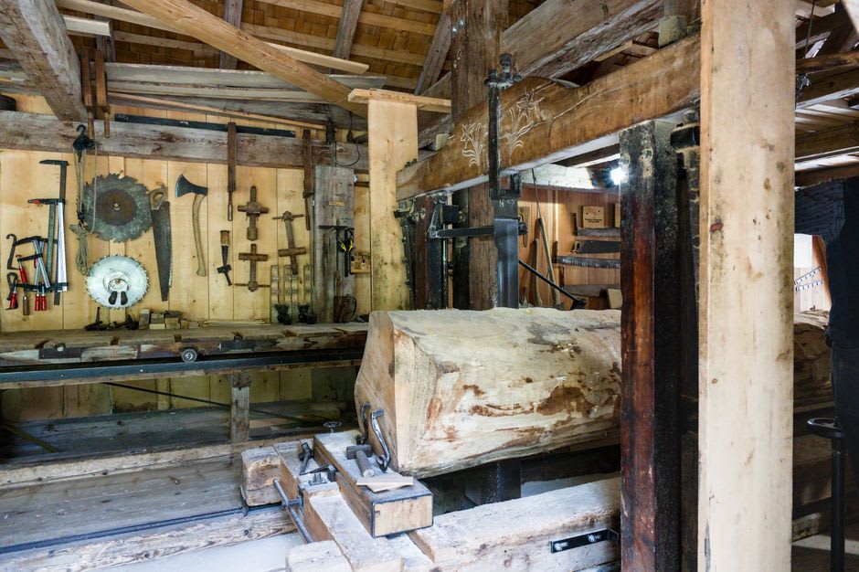 Wooden milling machinery inside the historic Konriko Rice Mill in New Iberia, Louisiana