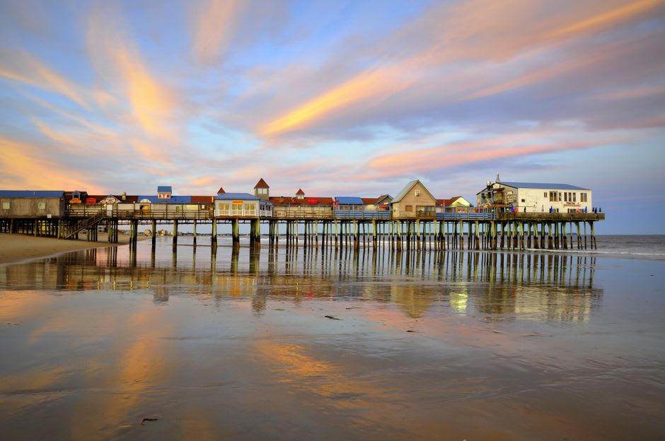 The wooden boardwalk along the bay at sunset in Niantic, Connecticut