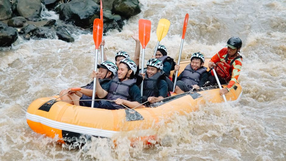 Rafters navigating whitewater rapids on the Youghiogheny River near Ohiopyle, Pennsylvania