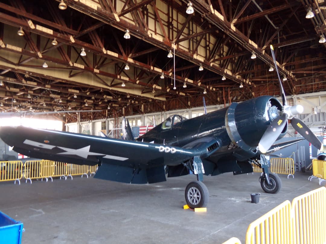 Vintage aircraft on display inside the EAA Aviation Museum hangar in Oshkosh, Wisconsin