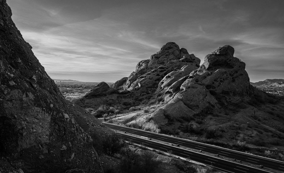 The angular desert-masonry terraces of Taliesin West set against the McDowell Mountains