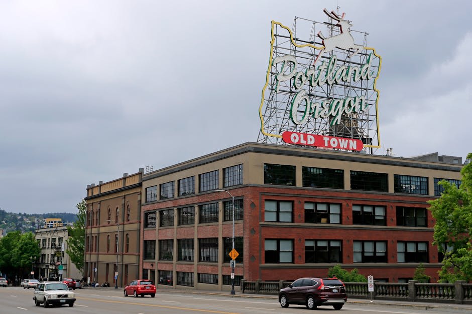 Portland city view with the river and bridges against a backdrop of green hills