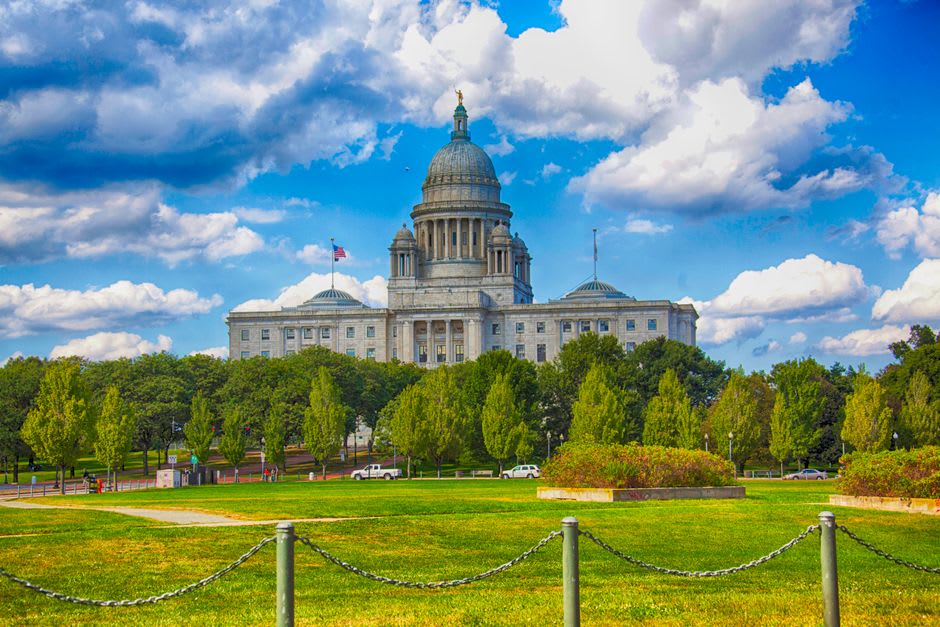 The white marble dome of the Rhode Island State House seen from the downtown riverwalk