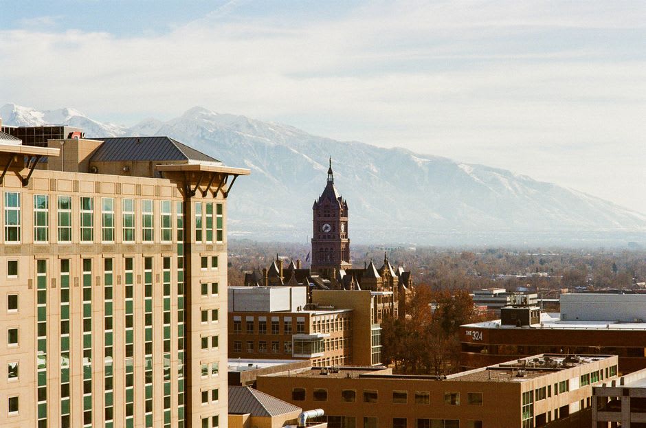 The granite spires of the Salt Lake Temple rising above the gardens of Temple Square