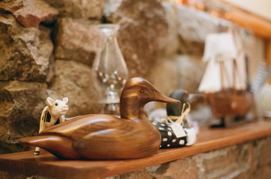 A display case of hand-carved wooden duck calls at a museum in Stuttgart, Arkansas