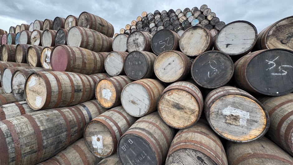 The limestone rickhouses and distillery grounds of a bourbon distillery outside Versailles, Kentucky