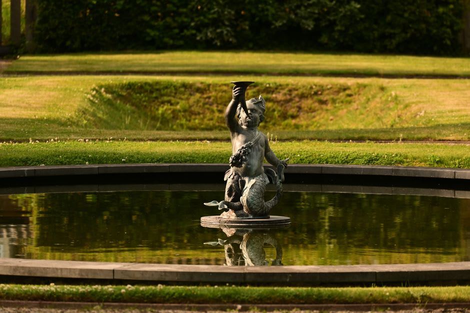 Bronze crane sculptures in the reflecting pool garden at the Woodson Art Museum in Wausau, Wisconsin