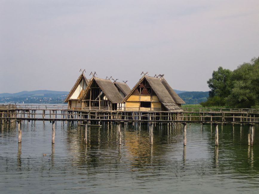 Reconstructed Bronze Age dwelling with timber roof at Arkaim open-air museum