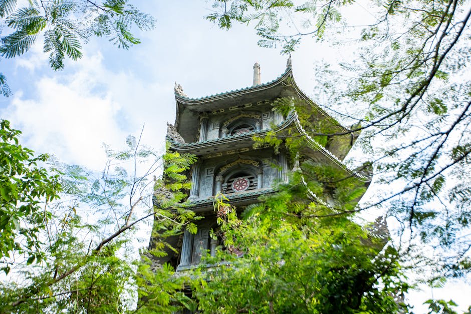 Ancient pagoda surrounded by lush greenery in Marble Mountains, Da Nang