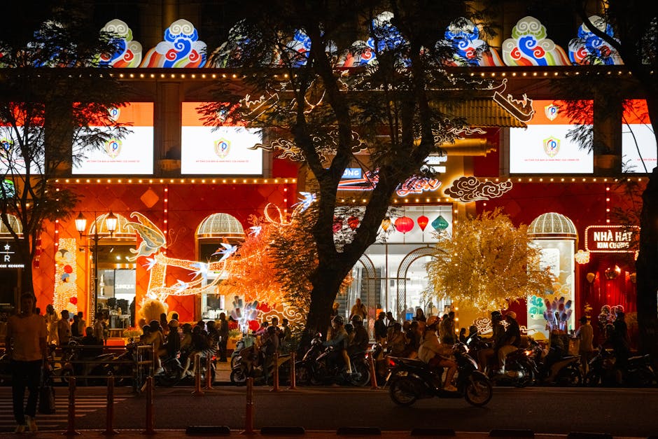 Bustling Ho Chi Minh City nightlife captured in a colorful street scene with neon lights