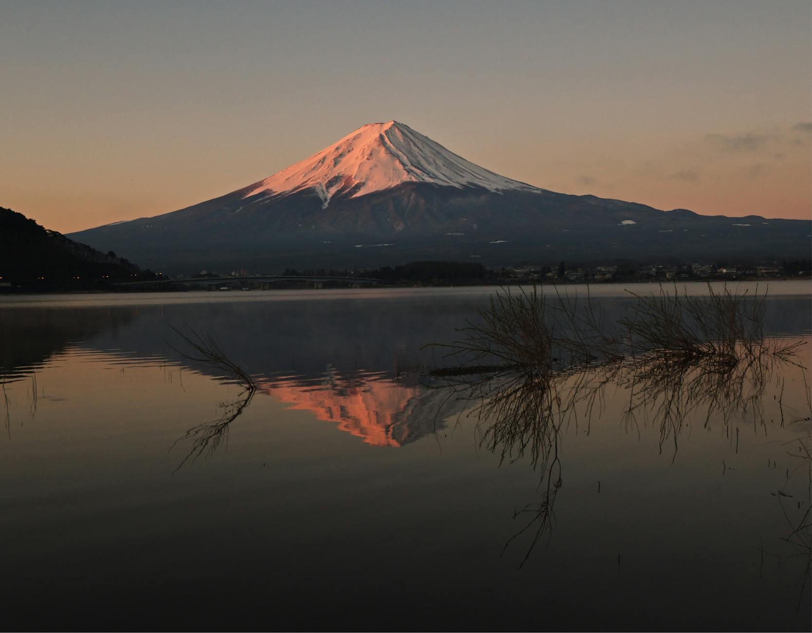 Mt. Fuji reflected in the still waters of Lake Kawaguchiko