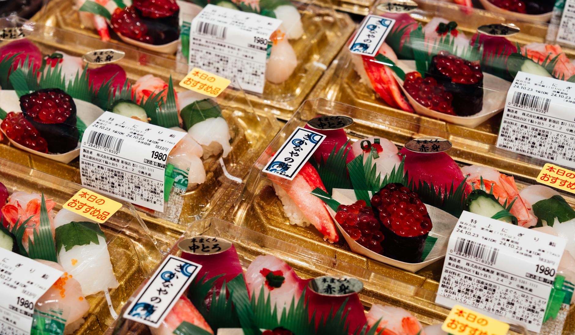 Fresh seafood and grilled skewers at Kuromon Ichiba Market in Osaka