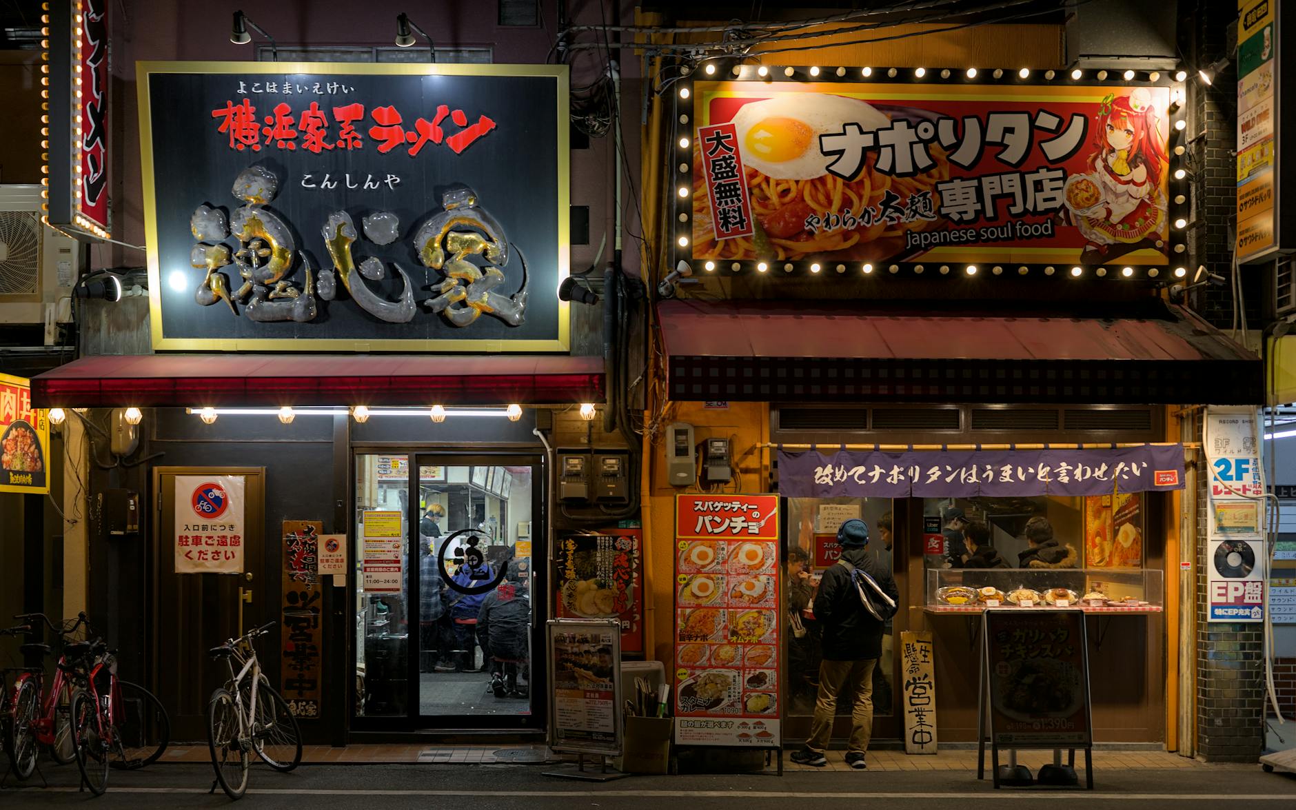 Osaka street food scene with warm lights and evening atmosphere