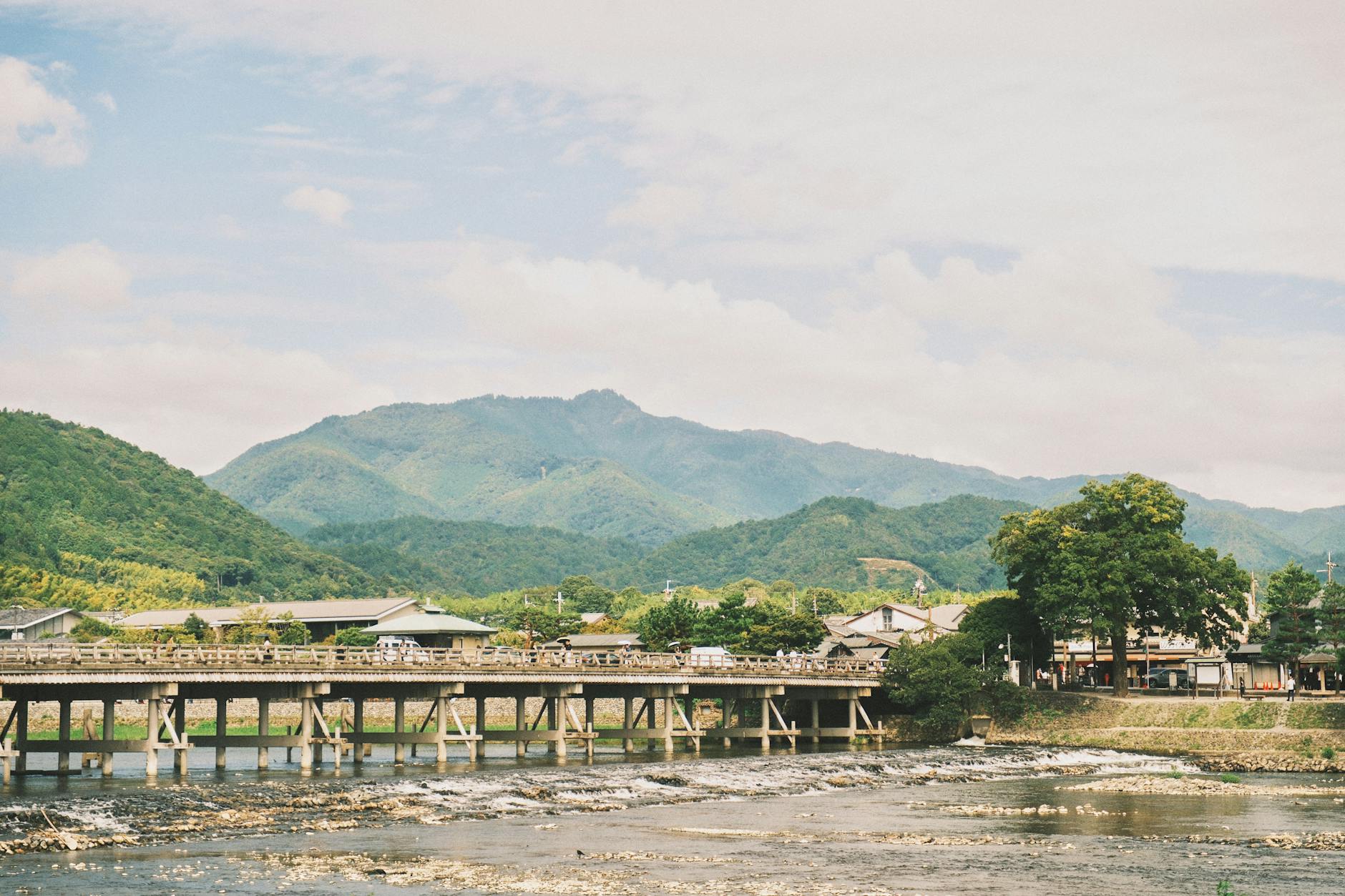 Togetsukyo Bridge spanning the Katsura River with Arashiyama mountains in the background