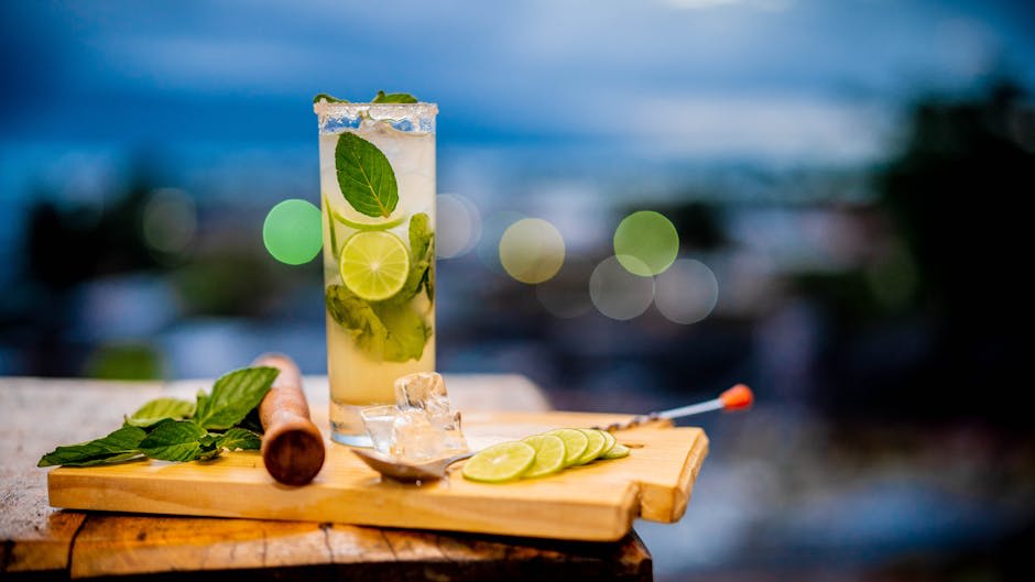 Rum cocktails and bottles at a Cuban bar