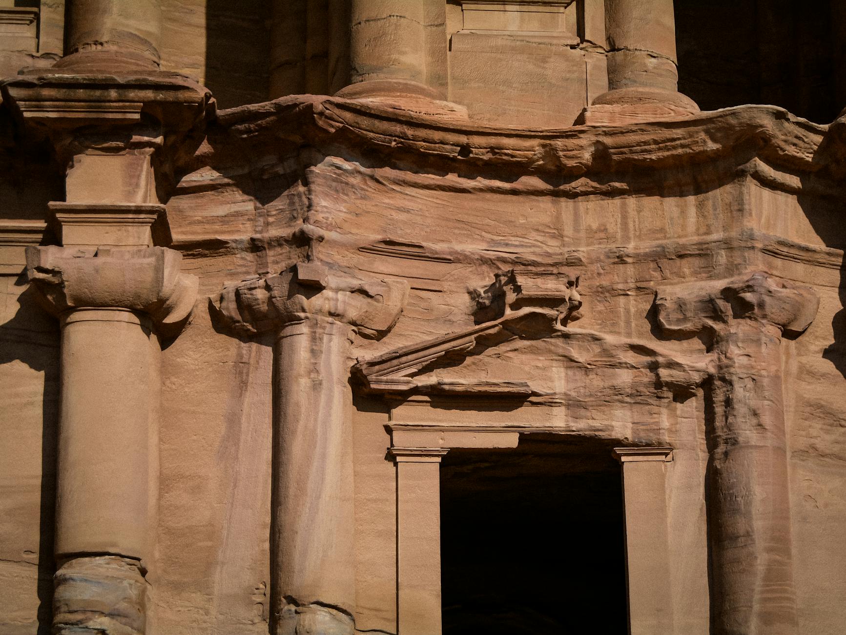 The Treasury facade of Petra glowing in warm golden light
