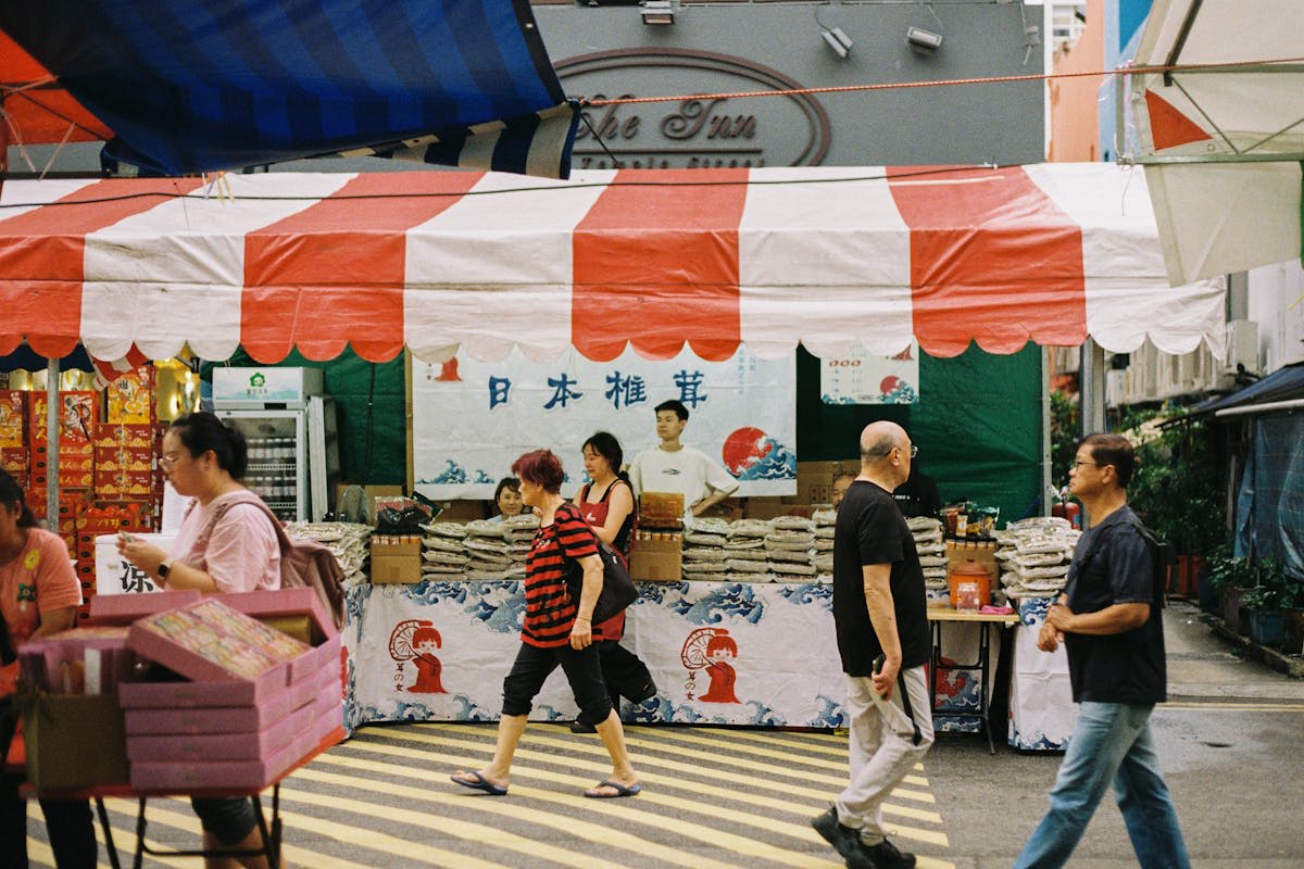 A vibrant food market with colourful dishes and aromatic spices on display
