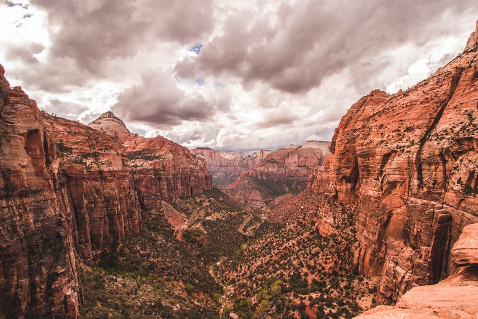The towering canyon walls of Zion with the Virgin River below