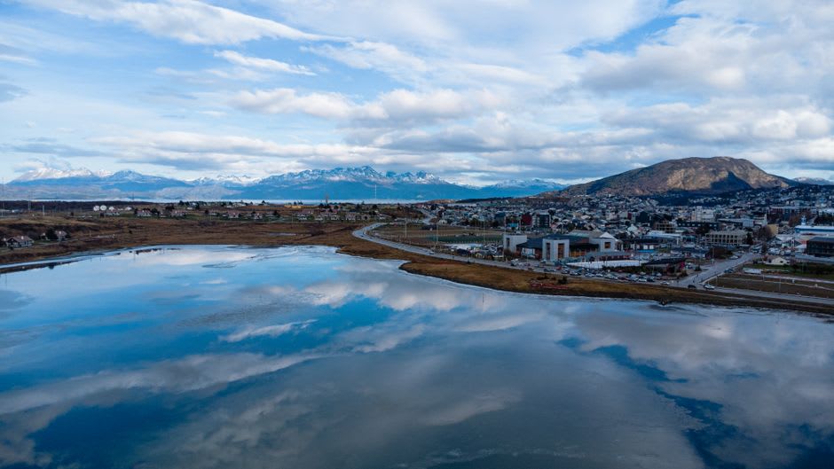 The still waters and forested shoreline of Lapataia Bay