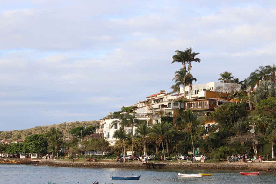 Turquoise cove of Praia de João Fernandes with granite headlands framing the beach