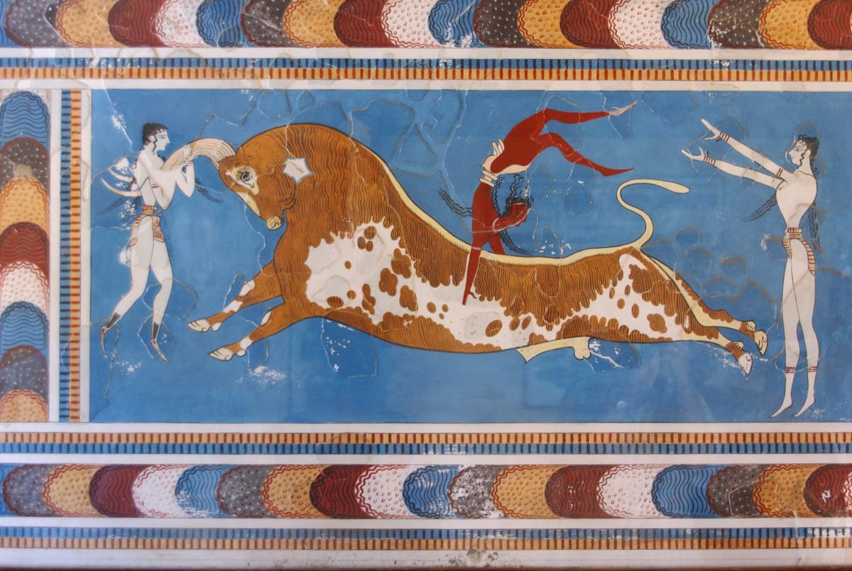 The reconstructed throne room at Knossos with its alabaster seat and surrounding griffin frescoes