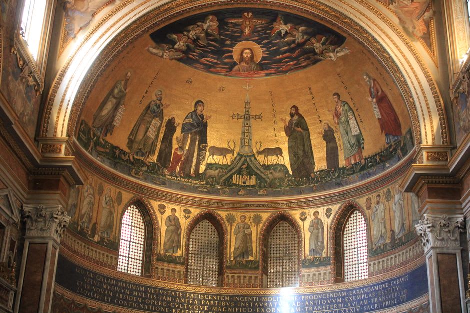 The mosaic-covered interior and dome of the Basilica of Saint Thérèse in Lisieux