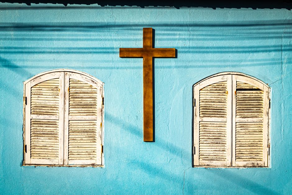 The creole-style church in Roura's central square with its painted wooden shutters