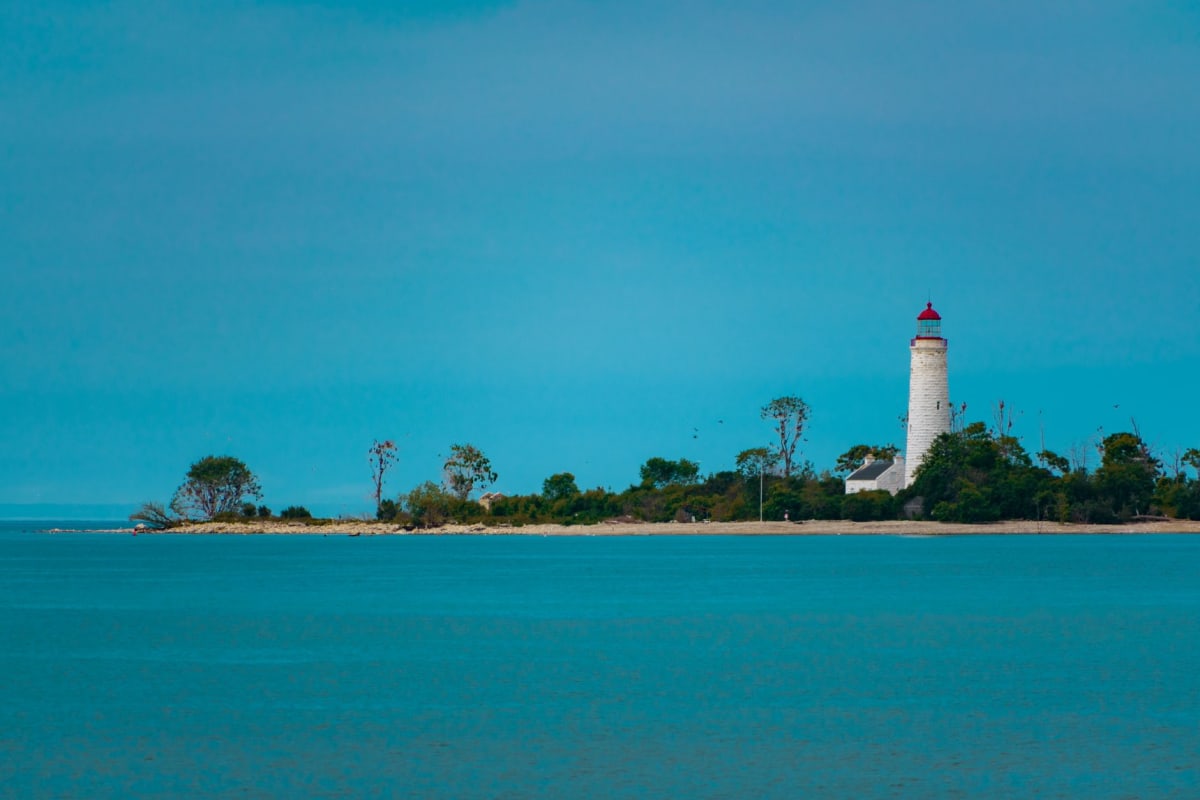 Stora Karlsö island seen from the Klintehamn shoreline, a limestone ridge rising from the Baltic in evening light