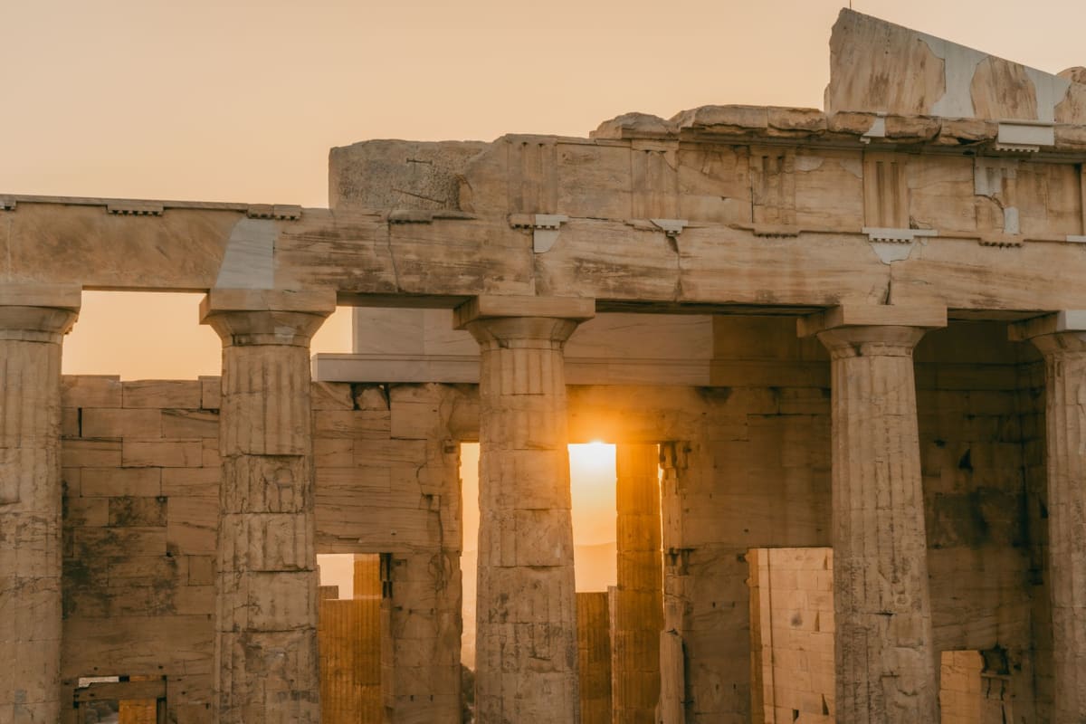 Sunset over the ancient columns and fortress ruins at Kamiros