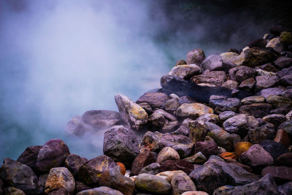 Steam rising from the Tapt Kund hot spring beside Badrinath temple in the cold mountain air