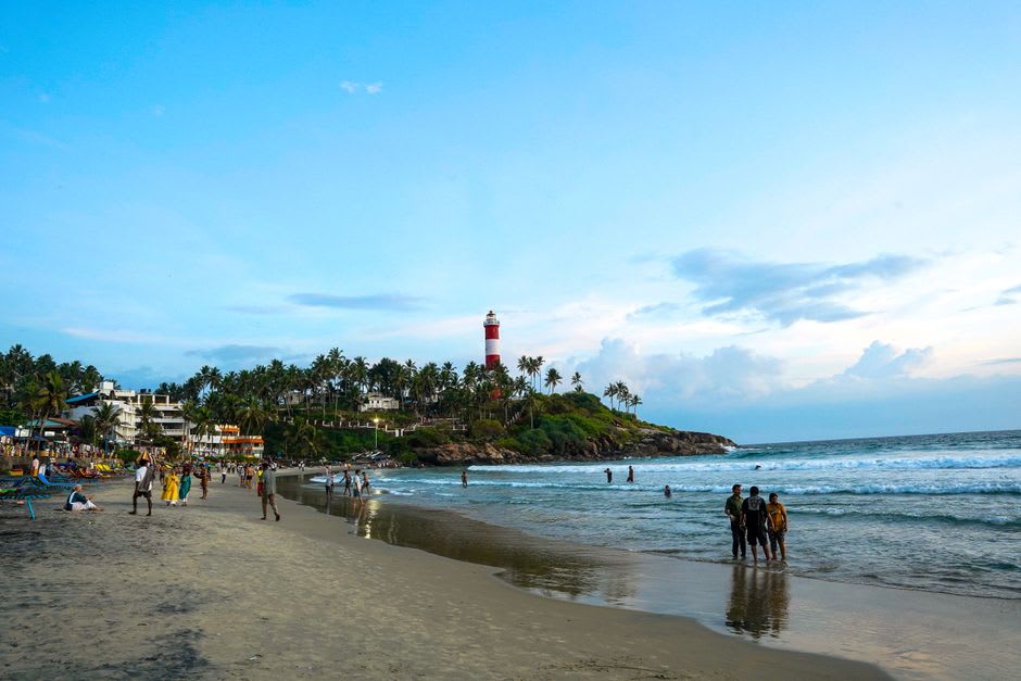 Bekal Beach and lighthouse at sunset, seen from the fort's outer walls