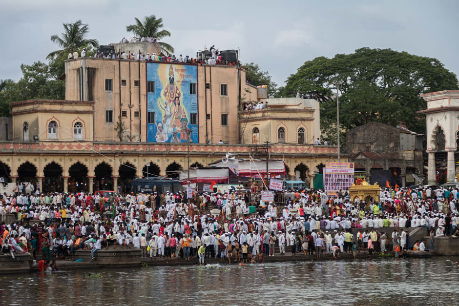 Pilgrims performing rituals along the Godavari River ghats in Nashik's Panchavati area
