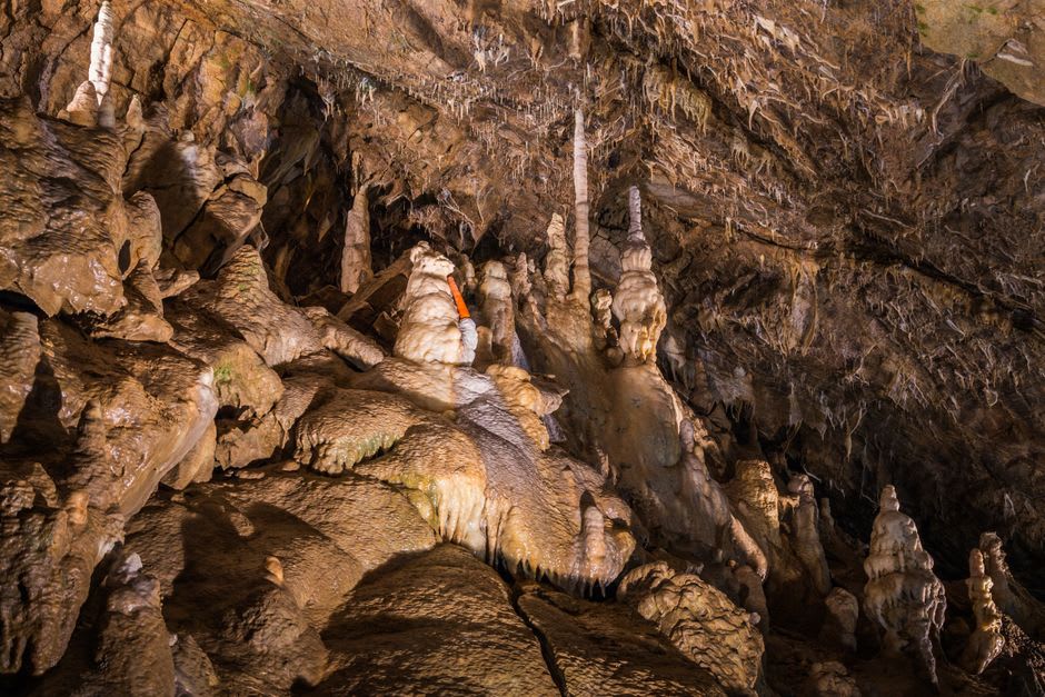 Ancient carved niches in the rock face at the Banias spring cave, once housing statues of Pan