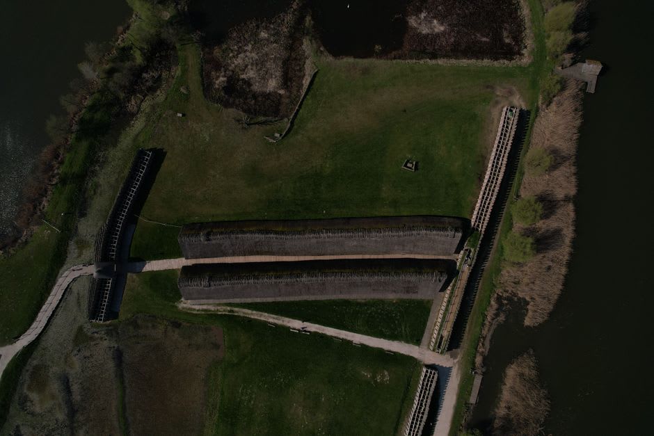 Grassy earthen ramparts at the reconstructed Shirakawa Barrier site, marking Japan's ancient northern frontier