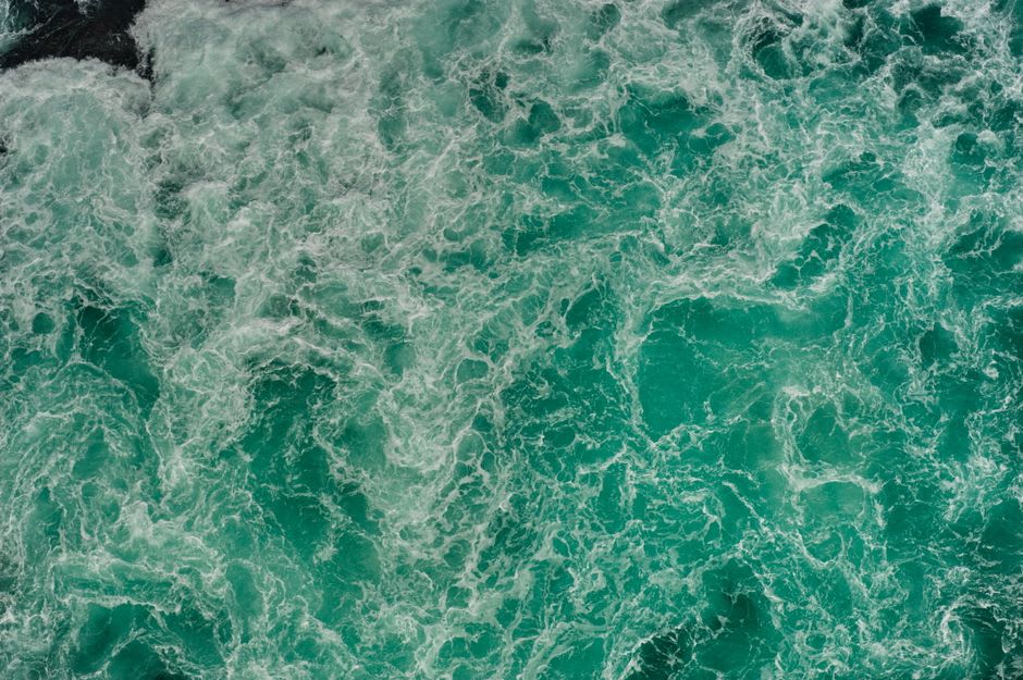 Swirling whirlpools in the Naruto Strait beneath the great suspension bridge