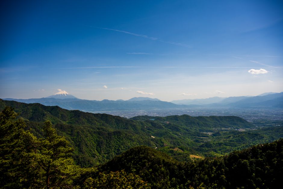 Panorama of ridges receding into blue distance from the summit of Mount Tsurugi