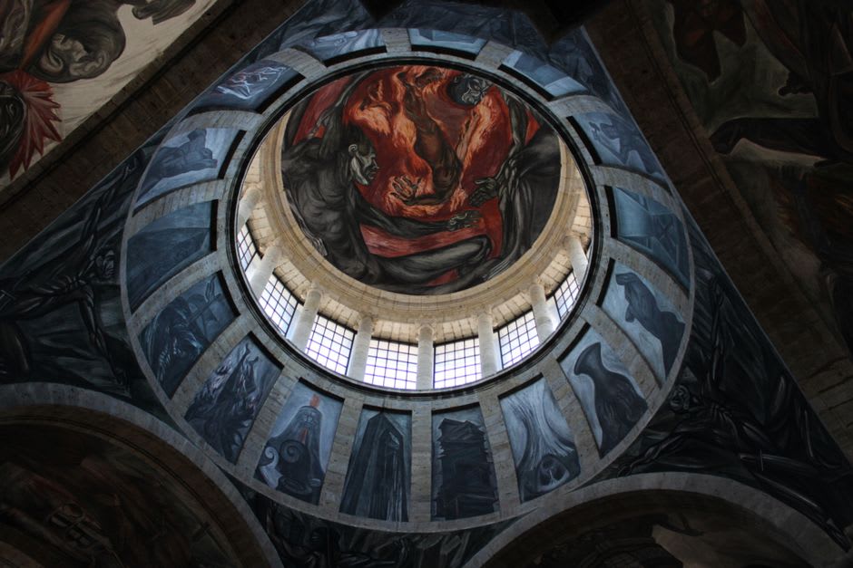Interior view of the Orozco murals covering the walls and vaulted ceiling of the Gabino Ortiz library in Jiquilpan