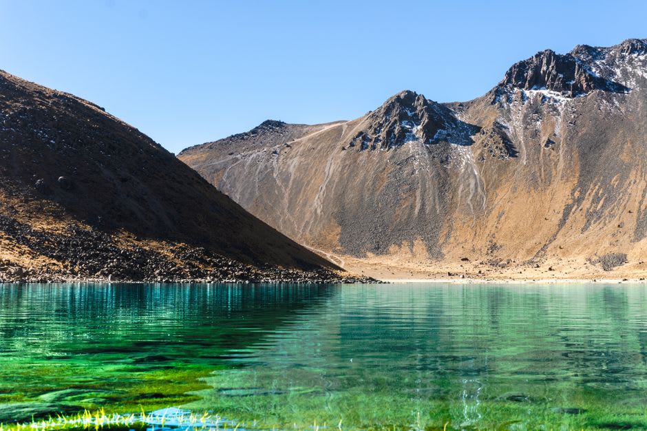 Lago de la Luna inside the Nevado de Toluca crater, turquoise water surrounded by volcanic rock