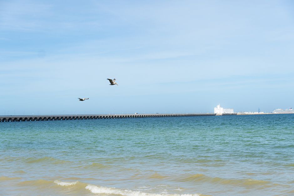 Progreso's long pier stretching over the calm shallow waters of the Gulf of Mexico