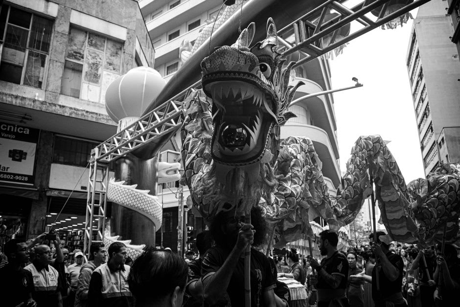 Traditional Coca dragon figure paraded through Monção's streets during the Festa da Coca