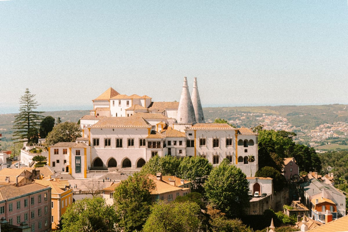 Sintra village cobblestone streets and historic palace facades in Portugal