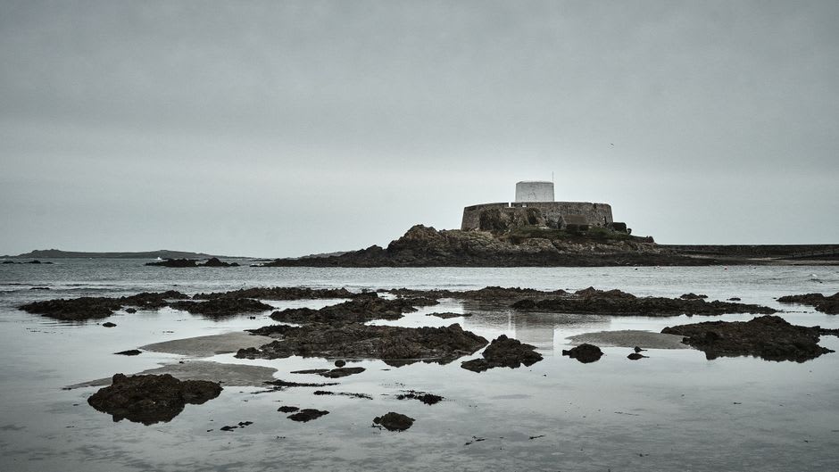 Ruins of the old fort at Cacela Velha overlooking the exposed sandbanks of the Ria Formosa at low tide