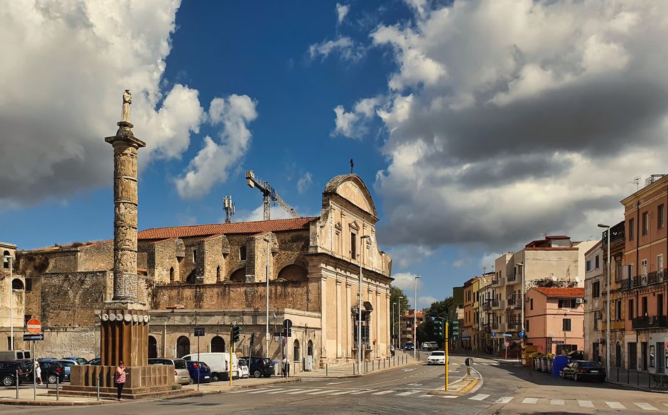 The grand Savoy-era Piazza d'Italia in central Sassari lined with cafés and civic buildings