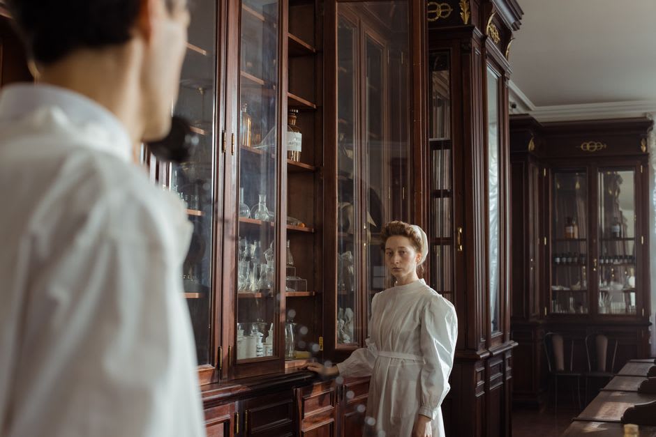 Interior of the historic monastery pharmacy with carved wooden apothecary cabinets