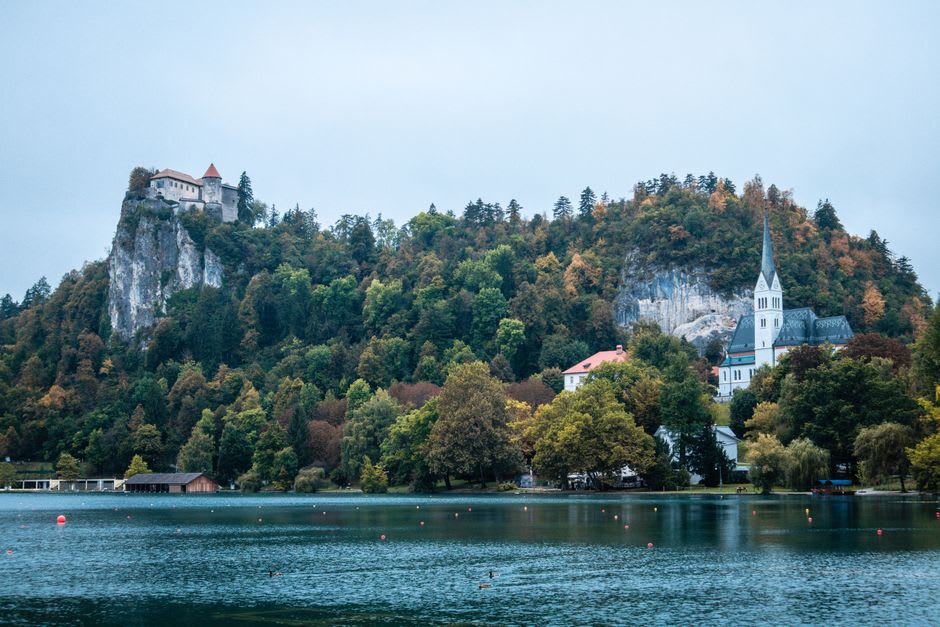 A view of Lake Bled, the island church, and the castle seen from the summit of Straža hill