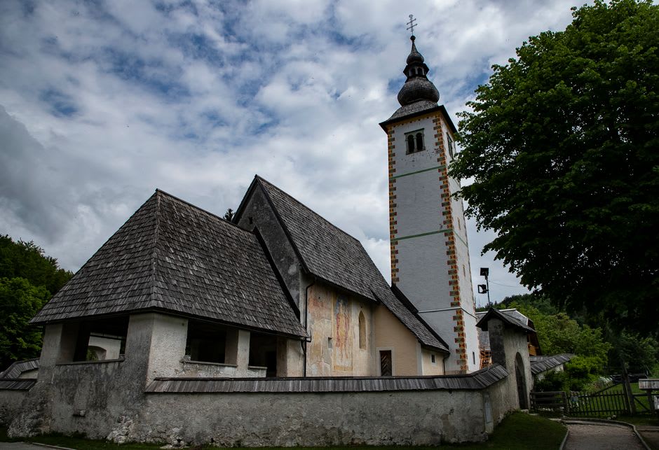Trnovo Church's twin white towers beside the Gradaščica canal
