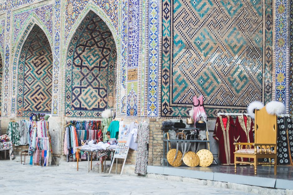 Stalls of dried fruit, scarves, and household goods at the Ishkashim border island market