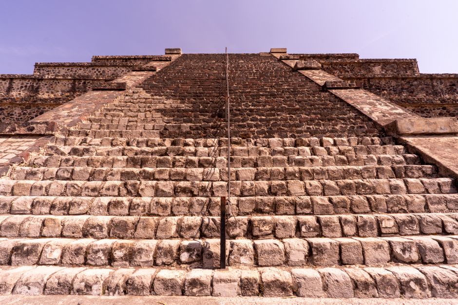 Weathered stone stairway climbing the steep face of Ek Balam's Acropolis pyramid